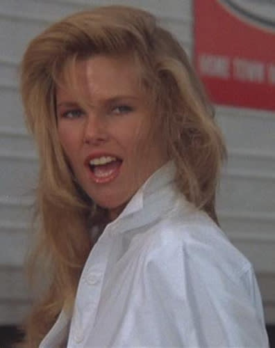 Christie Brinkley's hot lady in "Vacation" defined the fantasy woman for a generation. Mostly she just wore a men's button down, flouncy-messy hair and a smile.
