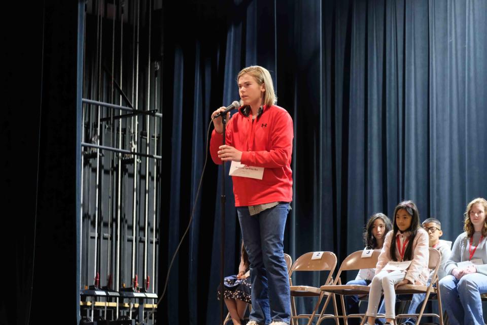 Jensen Betzen, a seventh-grader from Randall Junior High School and this year's runner-up, spells a word early in the 2023 Regional Spelling Bee Saturday at Tascosa High School in Amarillo.
