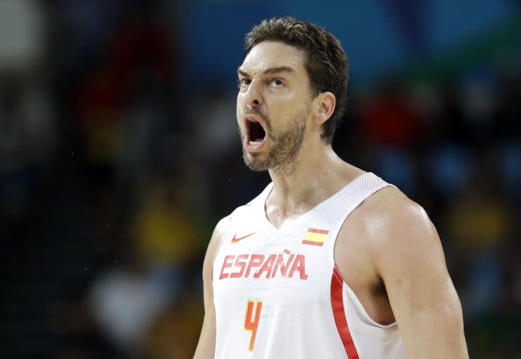 Spain's Pau Gasol reacts after making a basket during a basketball game against Lithuania. (AP)