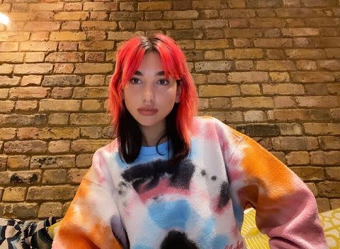 <p>Ok, how did red become the unofficial quarantine hair color? Idk, but I'm into it. Any and all shades of crimson are trending right now, including this electric tint seen on queen Dua Lipa.</p><p><a href="https://www.instagram.com/p/CAv-TAXhLBK/" rel="nofollow noopener" target="_blank" data-ylk="slk:See the original post on Instagram;elm:context_link;itc:0;sec:content-canvas" class="link ">See the original post on Instagram</a></p>