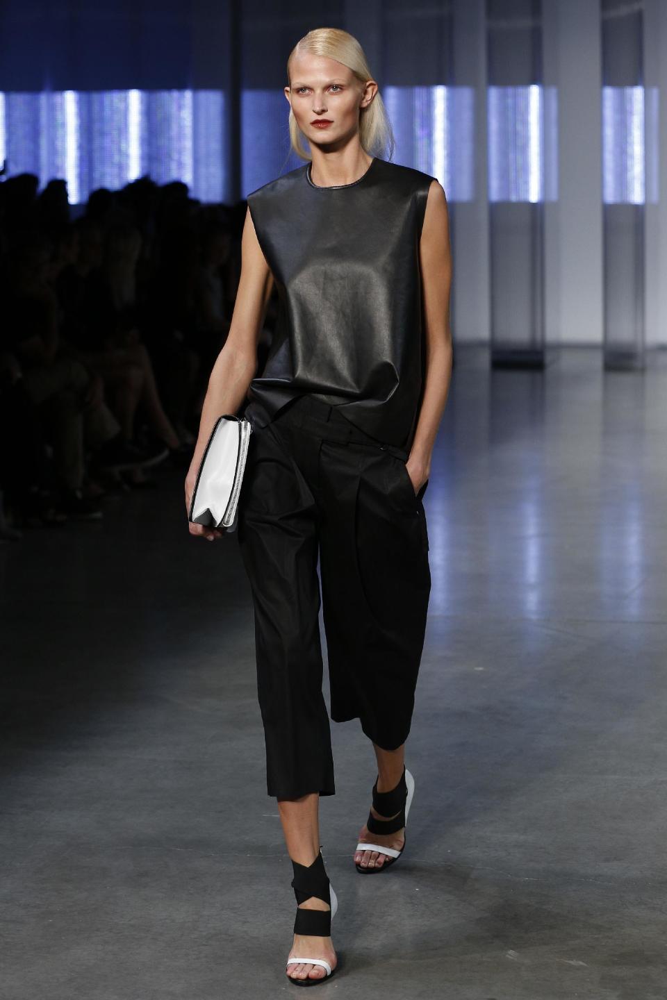 The Helmut Lang Spring 2014 collection is modeled during Fashion Week in New York, Friday, Sept. 6, 2013. (AP Photo/John Minchillo)