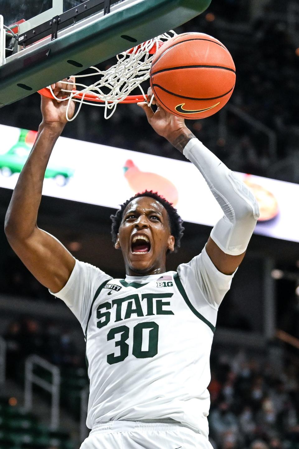 Michigan State's Marcus Bingham Jr. dunks against Ferris State during the first half on Wednesday, Oct. 27, 2021, at the Breslin Center in East Lansing.