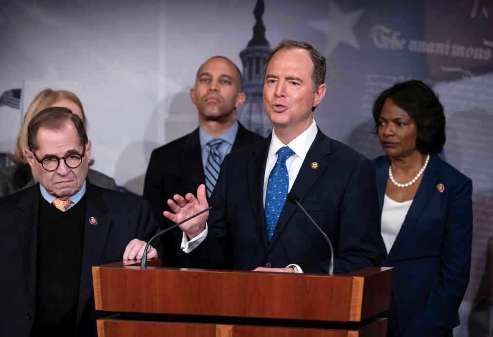 House Democratic impeachment managers, from left, Judiciary Committee Chairman Jerrold Nadler, Rep. Hakeem Jeffries, Intelligence Committee Chairman Adam Schiff and Rep. Val Demings discuss the impeachment trial of President Donald Trump.