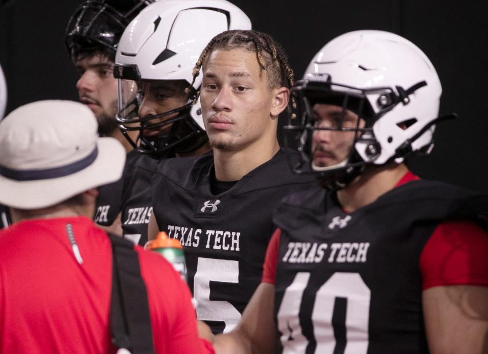 Texas Tech linebacker center Mike Dingle is shown during an August practice.  Coach Joey McGuire says his team is trying to decide whether the redshirt freshman can help more at inside linebacker, where he played last season, or at safety outside linebacker, where he worked this spring.