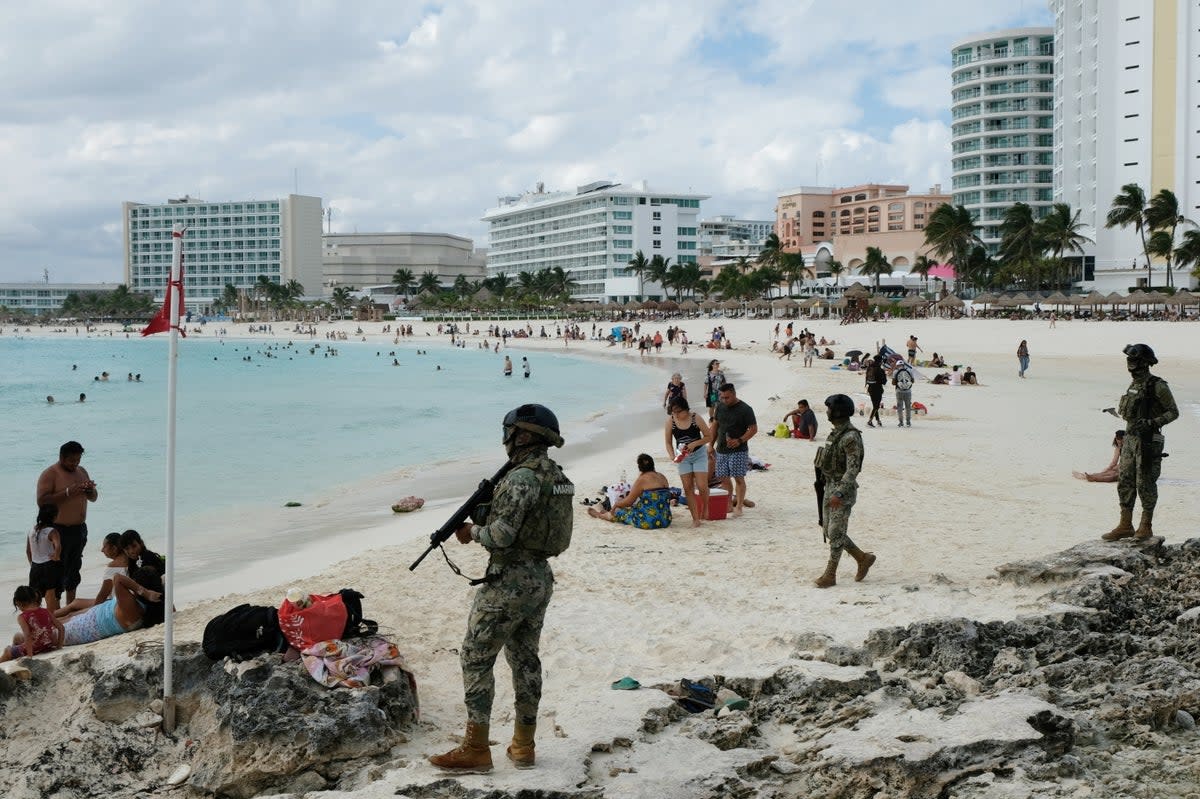 Members of the Navy patrol a beach resort as part of the vacation security in the tourist zone in Cancun by the government of Quintana Roo (REUTERS)