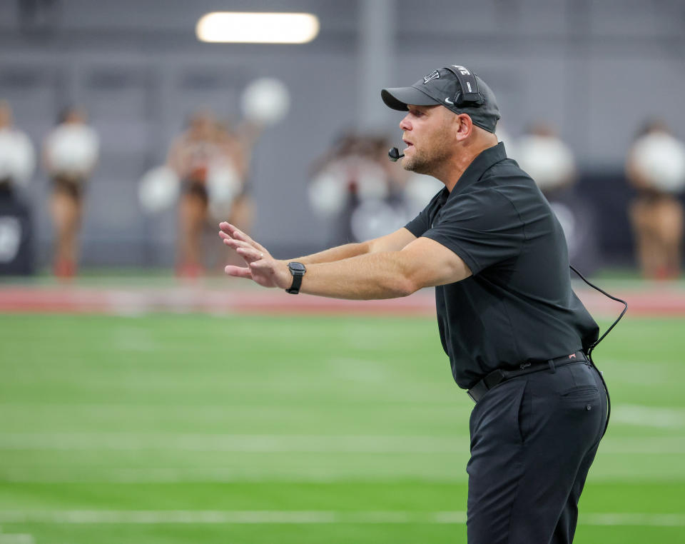 LAS VEGAS, NEVADA - SEPTEMBER 16: Head coach Barry Odom of the UNLV Rebels gestures to his players on the sideline in the second quarter of their game against the Vanderbilt Commodores at Allegiant Stadium on September 16, 2023 in Las Vegas, Nevada. The Rebels defeated the Commodores 40-37. (Photo by Ethan Miller/Getty Images)