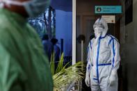 Medical workers treat patients infected with the coronavirus disease (COVID-19) in a hospital in New Delhi