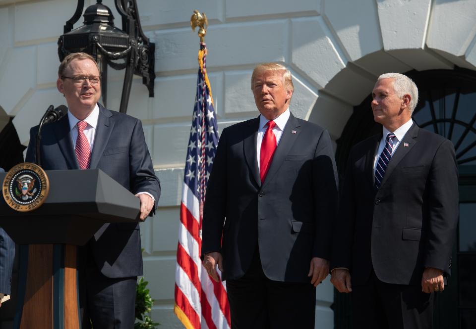 Kevin Hassett, chairman of the Council of Economic Advisers, speaks about the economy as U.S. President Donald Trump (center) and Vice President Mike Pence (Republican) look on at the White House in Washington, DC, on July 27, 2018. The U.S. economy boomed in the second quarter, posting the highest annual growth rate in nearly four years and being the strongest in the developed world, government data released Friday showed.  (Photo by NICHOLAS KAMM/AFP) (Photo by NICHOLAS KAMM/AFP via Getty Images)