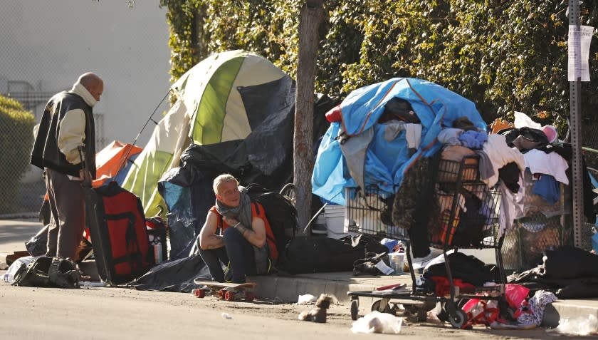 VENICE, CA - JANUARY 30, 2020 Homeless people living on 3rd avenue near Rose Avenue in Venice prepare for a scheduled clean up. We are talking to homeless people in Venice about enforcement of sidewalk sleeping rules. (Al Seib / Los Angeles Times)