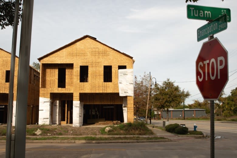 On Houston’s Emancipation Ave., newly constructed homes catering to a new class of Black residents have increased fears of displacement. The average Black household in this historically Black community earns just two-thirds of the average Black household in Texas. (Riot Muse)