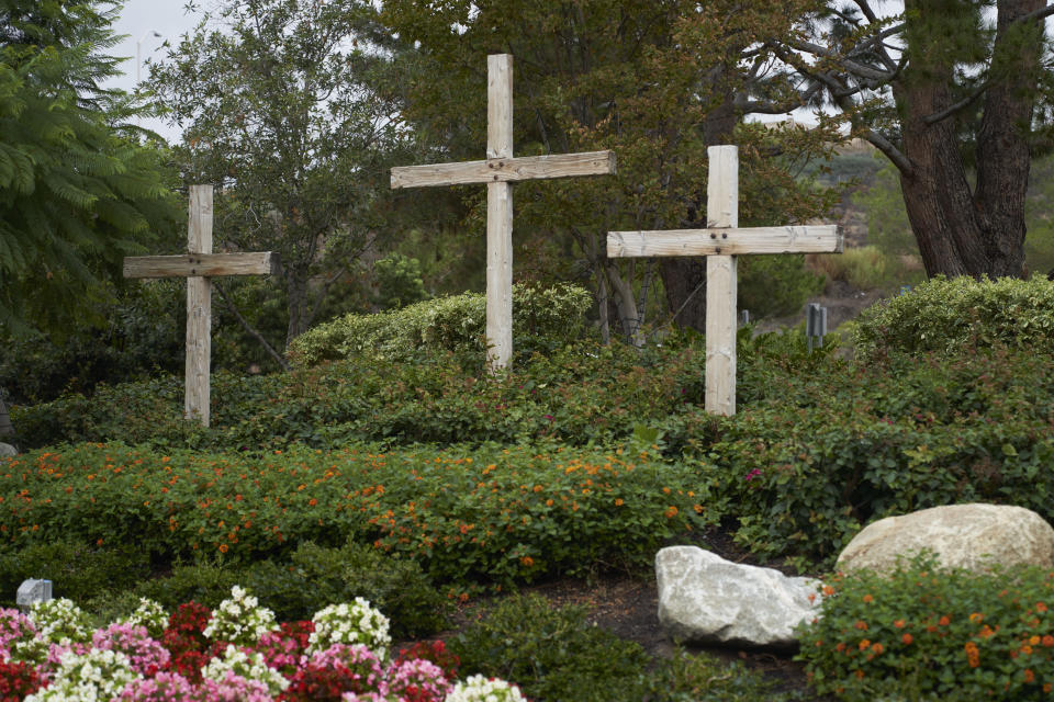 Wooden crosses are displayed in the garden at Saddleback Church on Sunday, Oct. 16, 2022, in Lake Forest, Calif. Pastor Andy Wood was recently announced as founding Pastor Rick Warren's successor to the church, which is the second largest in the Southern Baptist Convention, regularly drawing in about 2,500 people with more online every Sunday. (AP Photo/Allison Dinner)