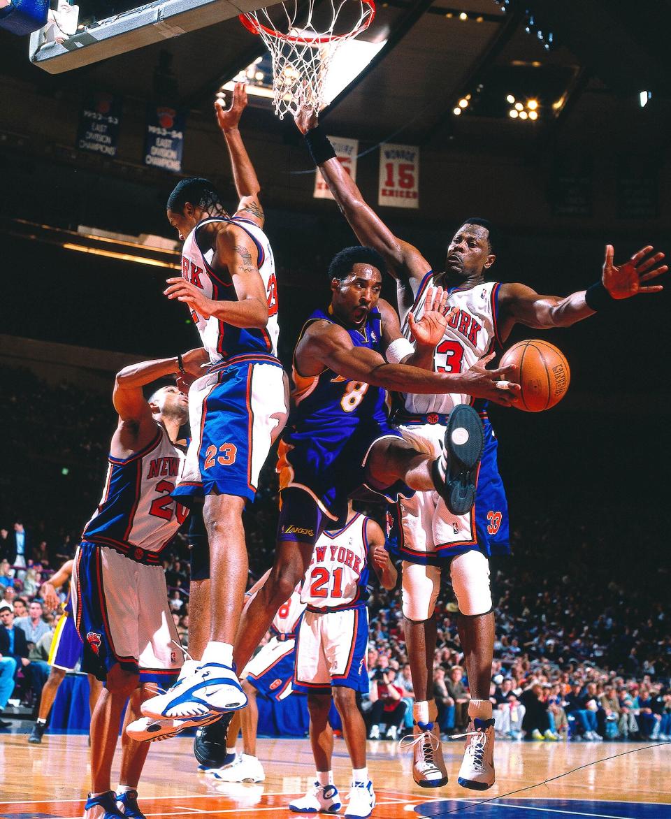 The New York Knicks' Patrick Ewing was no match for Bryant in this photo taken back in 2000 at Madison Square Garden in N.Y.C.