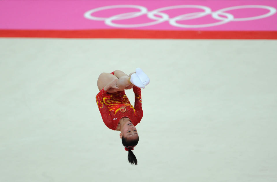 China's Lu Sui competes on the floor during the Artistic Gymnastics Women's team final at the North Greenwich Arena, London during day four of the London 2012 Olympics.. 