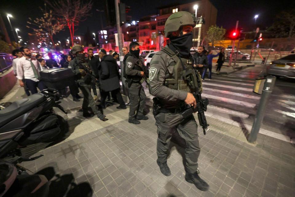 Armed police at the scene of the deadly shooting in Jerusalem  (AFP via Getty Images)