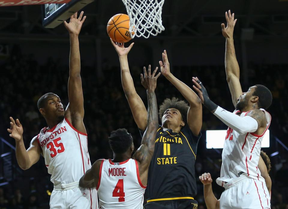 Wichita State 6-foot-11 sophomore Kenny Pohto, here going to the basket in a game vs. Houston last season,  had 21 points and 11 rebounds in the Shockers last game against ECU.