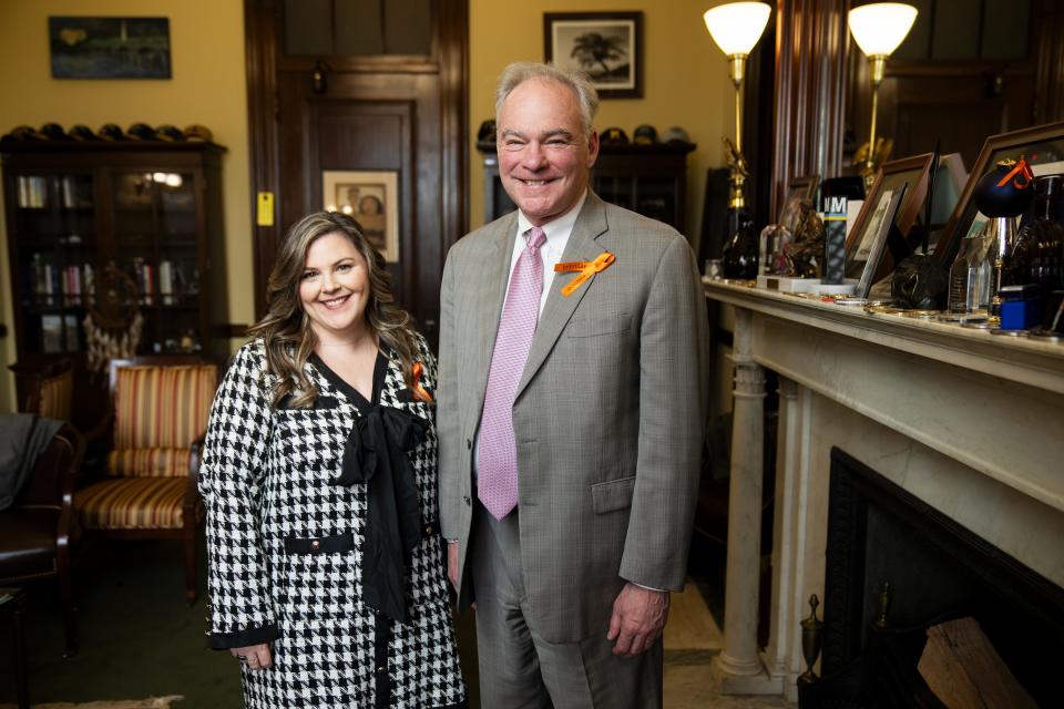 Elizabeth Carr, the first IVF baby to be born in the U.S., and Sen. Tim Kaine (D-Va.) pose for a portrait Thursday, March 7, 2024. Carr was born in 1981 and is now speaking out against the Alabama Supreme Court which ruled last month that frozen embryos are children and that people can be held legally responsible if they are destroyed. The court’s ruling alarmed prospective parents and IVF clinics, and the real-world consequences were immediate. At least three Alabama medical facilities halted in vitro fertilization treatments.