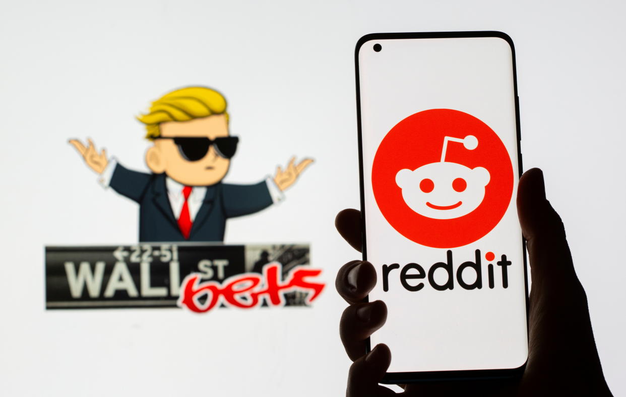 The Reddit logo is seen on a smartphone in front of a displayed Wall Street Bets logo in this illustration taken January 28, 2021. REUTERS/Dado Ruvic/Illustration