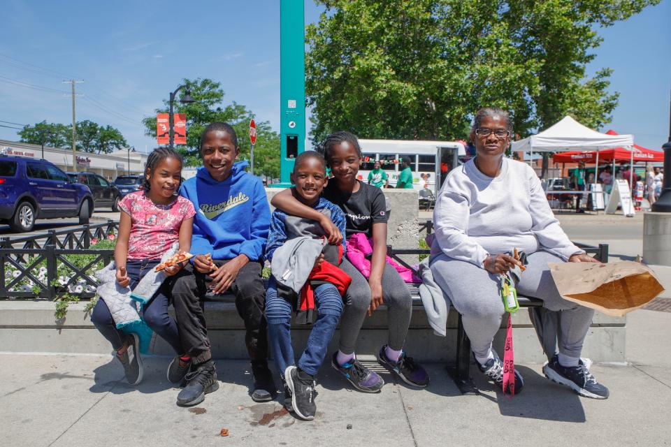 From left, Kimah Iverson, 7, Zaheire Iverson, 13, Mykale Iverson, 6, Mckay Iverson, 9, and their great aunt Patrice Denham 54, at the Juneteenth Fest at the Eastern Market in Detroit on Sunday, June 19, 2022. 