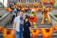 <p>The <em>Property Brothers</em> star and the <em>New Girl</em> actress, who have been dating for two years, visited Disneyland in California this past weekend. Seen here with Goofy, Donald and Pluto, the couple got in the spooky spirit by celebrating the park's family-friendly "Halloween Time" events.</p>