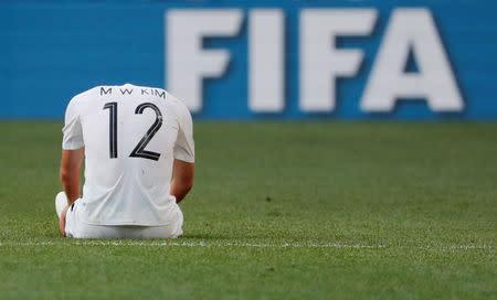 Soccer Football - World Cup - Group F - Sweden vs South Korea - Nizhny Novgorod Stadium, Nizhny Novgorod, Russia - June 18, 2018 South Korea's Kim Min-woo looks dejected after the match REUTERS/Carlos Barria