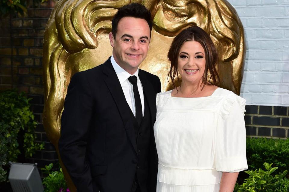 All over: Lisa Armstrong pictured with her estranged husband Ant McPartlin (PA)