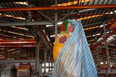 A statue of a god is seen at the Chuanso factory that manufactures religious objects in Pingtung, Taiwan July 5, 2016. REUTERS/Tyrone Siu