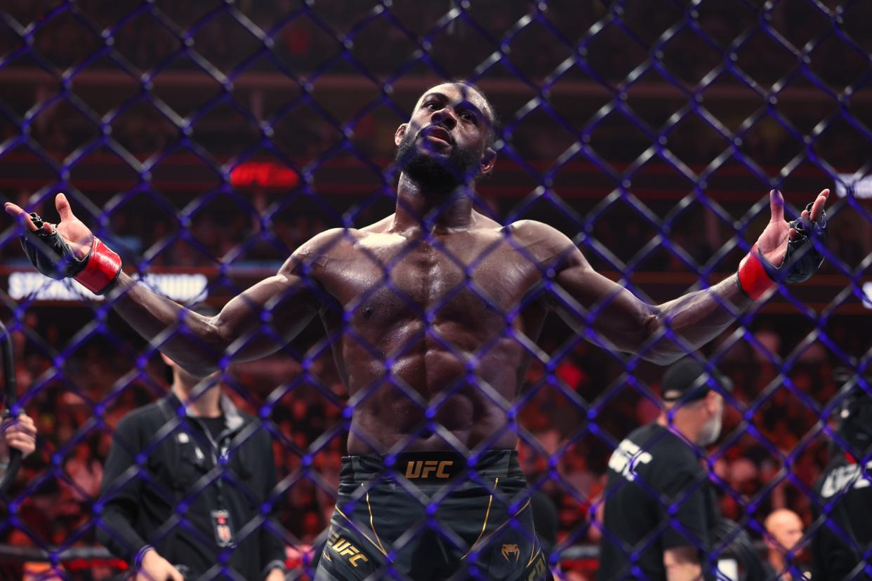 May 6, 2023; Newark, New Jersey, USA; Aljamain Sterling (red gloves) reacts after defeating Henry Cejudo (blue gloves) during UFC 288 at Prudential Center. Mandatory Credit: Ed Mulholland-USA TODAY Sports