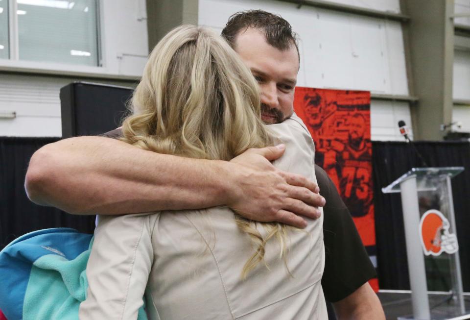 Cleveland Browns offensive lineman Joe Thomas hugs his wife Annie after his farewell speech during a news conference, Monday, March 19, 2018, at the team's headquarters in Berea. Thomas retired as 10-time Pro Bowler in his 11-year career.