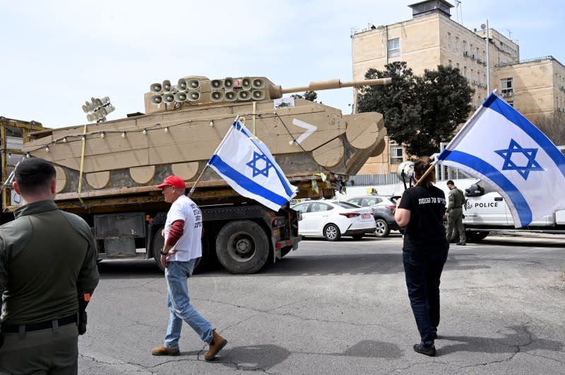 A replica of a tank was used during Tuesday's protest against military exemption for the Ultra-Orthodox Haredim in Jerusalem on Tuesday. Photo by Debbie Hill/UPI