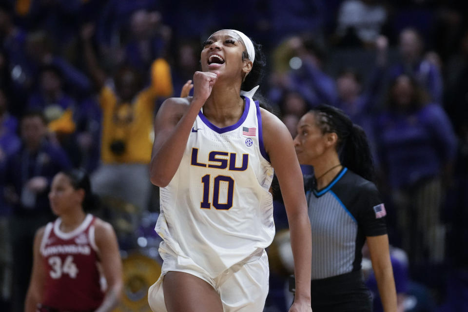 LSU forward Angel Reese (10) celebrates after a turnover in the second half an NCAA college basketball game against Arkansas in Baton Rouge, La., Thursday, Jan. 19, 2023. LSU won 79-76. (AP Photo/Gerald Herbert)