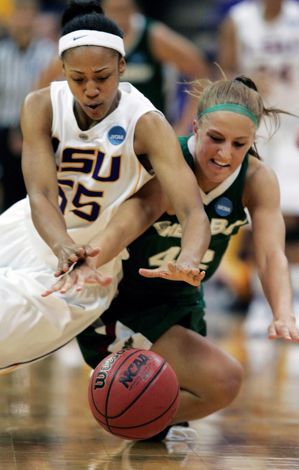 LSU forward LaSondra Barrett (55) and Wisconsin-Green Bay forward Kayla Tetschlag (42) reach for a loose ball in the second half during the first-round of the women's NCAA college basketball tournament in Baton Rouge, La.,  Sunday, March 22, 2009.