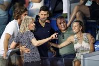 Serbia's Novak Djokovic with his wife Jelena, his father Srdjan, his mother Dijana and his brother Marko in the stands during Adria Tour at Novak Tennis Centre in Belgrade