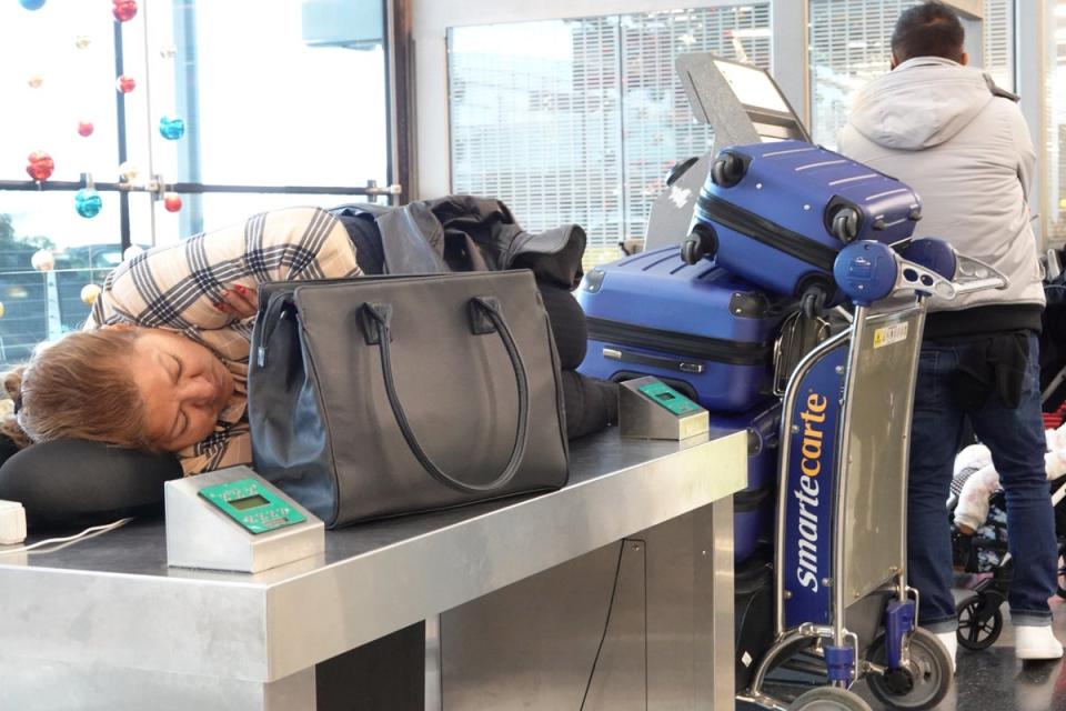 Travelers waits for flights at O’Hare International Airport on December 22, 2022 in Chicago, Illinois. As of 8AM more than 400 flights out O’Hare had been canceled (Getty Images)