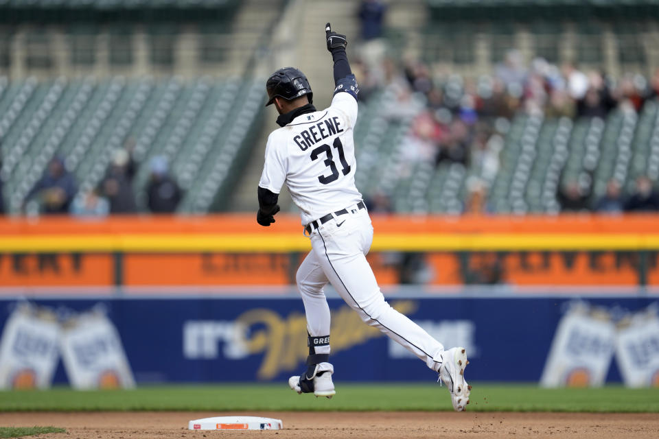 Detroit Tigers' Riley Greene reacts to hitting a home run against the Cleveland Guardians in the sixth inning of the second game of a doubleheader baseball game in Detroit, Tuesday, April 18, 2023. (AP Photo/Paul Sancya)