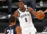 Brooklyn Nets' Jeremiah Martin (0) moves the ball against the Orlando Magic during the first half at of an NBA basketball game Tuesday, Aug. 11, 2020, in Lake Buena Vista, Fla. (Mike Ehrmann/Pool Photo via AP)