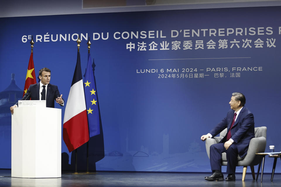 Macron y Xi Jinping en su encuentro en París. (Mohammed Badra, Pool via AP)