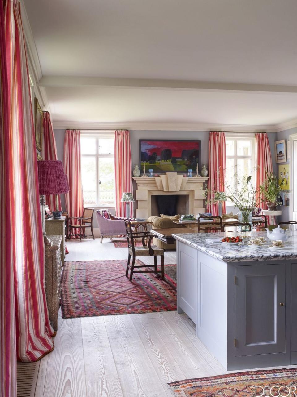 <p>This <a rel="nofollow noopener" href="https://www.elledecor.com/design-decorate/house-interiors/a9396/english-estate/" target="_blank" data-ylk="slk:17th-century English estate;elm:context_link;itc:0;sec:content-canvas" class="link ">17th-century English estate</a> isn't afraid of colorful decor. The subtle blue kitchen island is by <a rel="nofollow noopener" href="http://www.plainenglishdesign.co.uk/" target="_blank" data-ylk="slk:Plain English;elm:context_link;itc:0;sec:content-canvas" class="link ">Plain English</a>, the mahogany table is Victorian, the curtains are of a <a rel="nofollow noopener" href="http://www.bennisonfabrics.com/" target="_blank" data-ylk="slk:Bennison Fabrics;elm:context_link;itc:0;sec:content-canvas" class="link ">Bennison Fabrics</a> stripe, and the walls are painted in Tablecloth by <a rel="nofollow noopener" href="http://www.paintandpaperlibrary.com/tablecloth" target="_blank" data-ylk="slk:Paint & Paper Library;elm:context_link;itc:0;sec:content-canvas" class="link ">Paint & Paper Library</a>.</p>