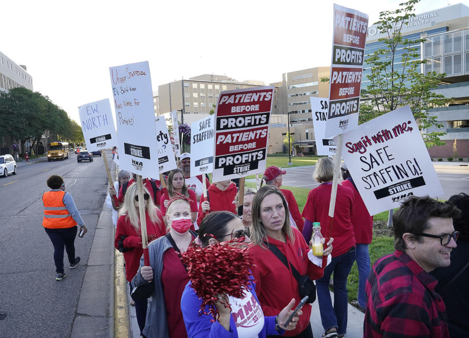 Nurses strike Monday, Sept. 12, 2022 outside North Memorial Health Hospital in Robbinsdale, Minn. Nurses launched a three-day strike over issues of pay and what they say is understaffing that has been worsened by the strains of the coronavirus pandemic. (David Joles/Star Tribune via AP)