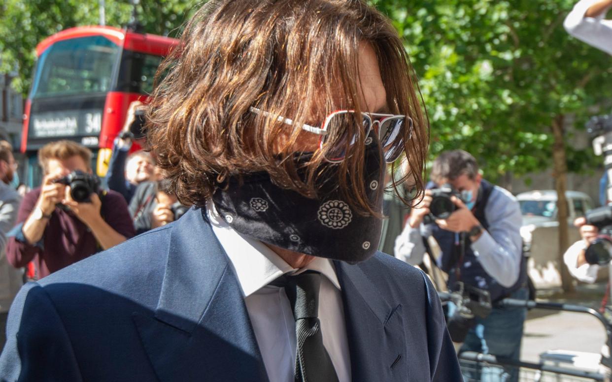 Johnny Depp arrives at High Court in face mask for first day of libel case over 'wife beating' story  - Julian Simmonds for The Telegraph