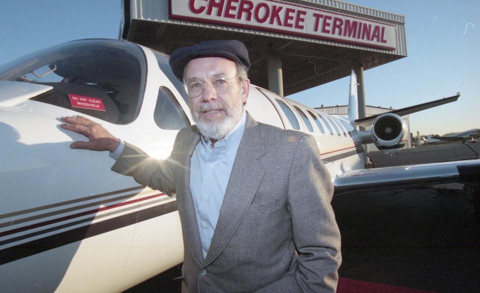 Jim Clayton stands next to his business jet based at Knoxville's McGhee Tyson airport. January, 1998