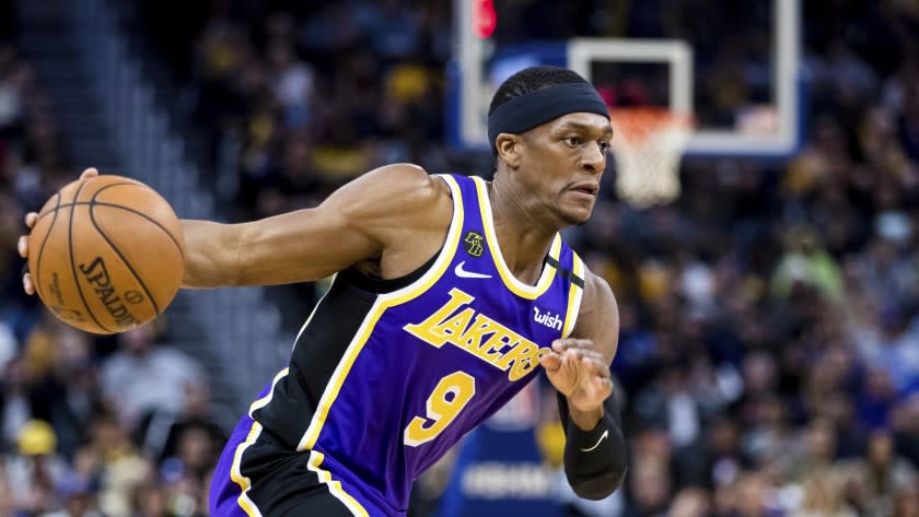 Los Angeles Lakers guard Rajon Rondo (9) dribbles against the Golden State Warriors.