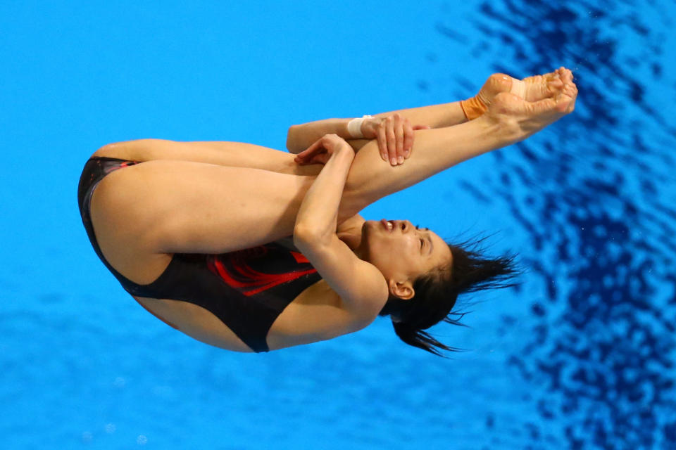 LONDON, ENGLAND - AUGUST 05: Minxia Wu of China competes in the Women's 3m Springboard final on Day 9 of the London 2012 Olympic Games at the Aquatics Centre on August 5, 2012 in London, England. (Photo by Al Bello/Getty Images)