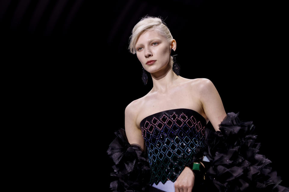 A model wears a creation as part of the Giorgio Armani Prive Haute Couture Spring-Summer 2023 collection presented in Paris, Tuesday, Jan. 24, 2023. (AP Photo/Lewis Joly)
