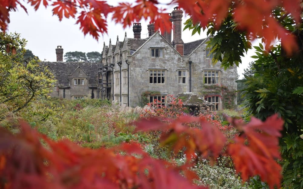 Autumn at Gravetye brings magenta dahlias galore, apple orchard harvests and red hot poker plants