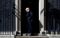 Britain's new Prime Minister, Boris Johnson, enters Downing Street, in London