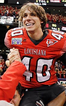 Louisiana-Lafayette K Brett Baer enjoys the ride after his 50-yard field goal as time expired gave his team a 32-30 victory over San Diego State in the New Orleans Bowl