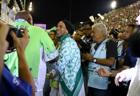 FILE PHOTO - Brazil's soccer player Ronaldinho participates during the second night of the carnival parade at the Sambadrome in Rio de Janeiro, Brazil February 28, 2017. REUTERS/Pilar Olivares