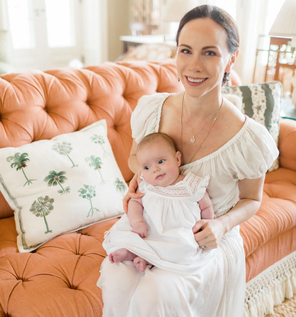 Barbara Bush and her baby girl, Cora Georgia, look like twins while wearing white dresses.  (Laura Foote)