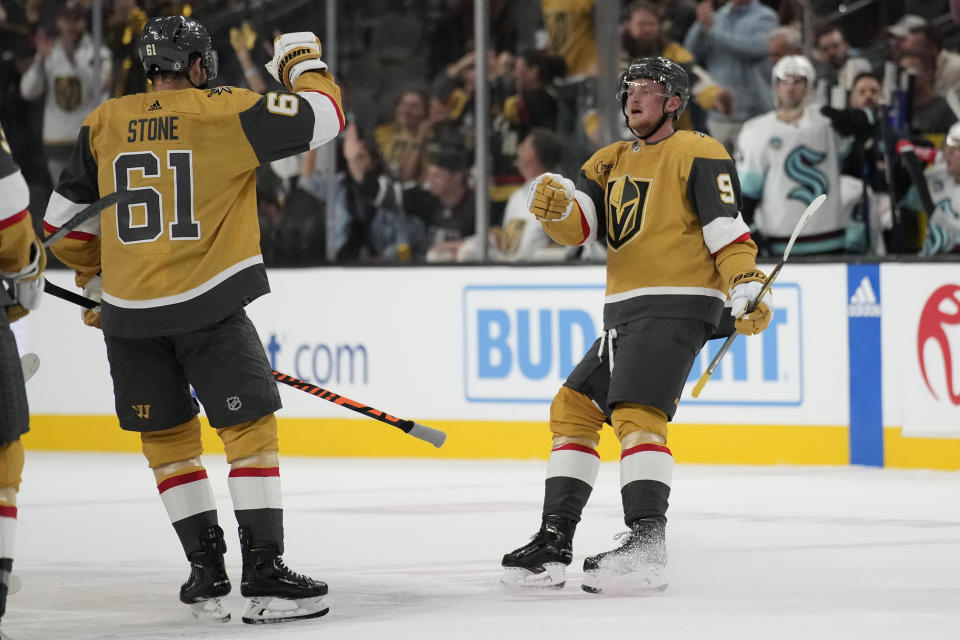 Vegas Golden Knights center Jack Eichel (9) celebrates after scoring on an open goal against the Seattle Kraken during the third period of an NHL hockey game Tuesday, Oct. 10, 2023, in Las Vegas. (AP Photo/John Locher)
