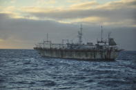 The Chinese-flagged Zhong Yuan Yu 16 sails at dusk on the high seas near the Galapagos Islands on July 18, 2021. In the summer of 2020, hundreds of Chinese vessels were discovered fishing for squid near the long-isolated Galapagos Islands, a UNESCO world heritage site that inspired 19th-century naturalist Charles Darwin and is home to some of the world’s most endangered marine species, from giant tortoises to hammerhead sharks. (AP Photo/Joshua Goodman)